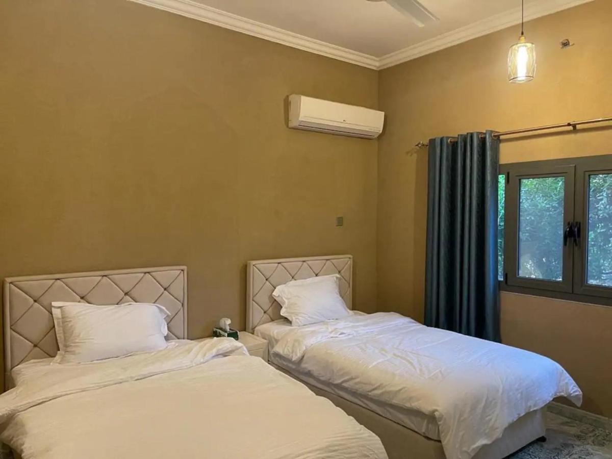 Rose Guesthouse Al 'Aqar Buitenkant foto