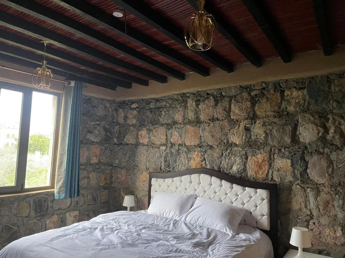 Rose Guesthouse Al 'Aqar Buitenkant foto
